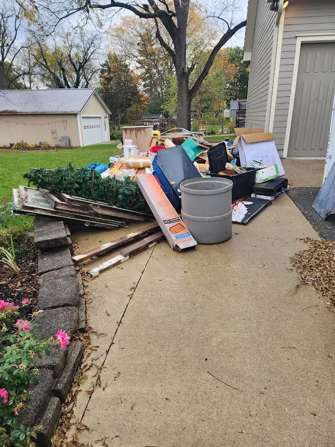 Dumpster being loaded with debris for 30 Yard Dumpster Rental in Mine Hill